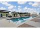 A community pool lined with cabanas provides residents with a refreshing outdoor space on a sunny day at 1120 E Kennedy Blvd # 912, Tampa, FL 33602