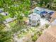 Beautiful backyard featuring a gazebo, well-maintained landscaping, and a private patio area for outdoor entertaining at 113 Maplewood Ave, Clearwater, FL 33765