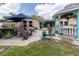 Beautiful outdoor area with chairs, patio, gazebo and garden at 113 Maplewood Ave, Clearwater, FL 33765