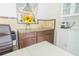 Kitchen area with sink, granite countertops, dark cabinets, and breakfast bar at 113 Maplewood Ave, Clearwater, FL 33765