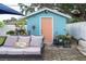 Outdoor Shed with a peach door features a patio at 113 Maplewood Ave, Clearwater, FL 33765