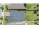 Overhead view of a home showcasing its roof, yard, and proximity to neighboring properties at 11315 Chilly Water Ct, Riverview, FL 33579