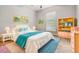 Bright bedroom with a cozy rug and bright furniture at 11315 Chilly Water Ct, Riverview, FL 33579