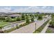 Gated entry to Crestview Lakes, featuring lush landscaping and a decorative community sign at 11315 Chilly Water Ct, Riverview, FL 33579