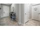 Hallway with tiled floors and neutral paint at 11315 Chilly Water Ct, Riverview, FL 33579