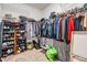 Spacious walk-in closet with shelving and hanging rods, providing ample storage space at 11315 Chilly Water Ct, Riverview, FL 33579