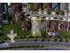 Aerial view of the property highlighting the landscape, nearby street and bordering neighboring homes in its residential location at 11327 Brighton Knoll Loop, Riverview, FL 33579