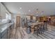 Spacious kitchen offers a large island with seating and stainless-steel appliances at 11327 Brighton Knoll Loop, Riverview, FL 33579