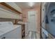 A functional laundry room with modern washer and dryer at 11327 Brighton Knoll Loop, Riverview, FL 33579