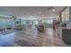 Spacious open-concept living area with an island, modern kitchen, and lots of natural light at 11327 Brighton Knoll Loop, Riverview, FL 33579