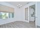 Dining room with window, chandelier and open doorway to kitchen at 11619 Cambium Crown Dr, Riverview, FL 33569