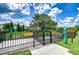 Fenced dog park with designated areas for large and small dogs, complete with waste stations at 11619 Cambium Crown Dr, Riverview, FL 33569
