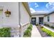 Stunning single story home featuring stone accents and lush landscaping at 11619 Cambium Crown Dr, Riverview, FL 33569