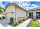 Beautiful garage featuring stone accents and lush landscaping at 11619 Cambium Crown Dr, Riverview, FL 33569