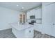 Contemporary kitchen with a center island, stainless steel appliances, and sleek finishes at 11619 Cambium Crown Dr, Riverview, FL 33569