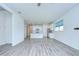 Inviting living room with modern flooring and an open layout to the kitchen at 11619 Cambium Crown Dr, Riverview, FL 33569