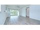 Bright living room with screened-in patio at 11619 Cambium Crown Dr, Riverview, FL 33569