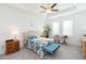 Relaxing primary bedroom featuring a ceiling fan and lots of natural light at 11717 74Th E Cir, Palmetto, FL 34221