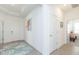 Bright hallway featuring neutral walls and flooring at 11717 74Th E Cir, Palmetto, FL 34221