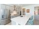 Well-equipped kitchen featuring stainless steel appliances, gas cooktop, and expansive countertops at 11717 74Th E Cir, Palmetto, FL 34221