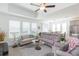 Bright open living area with lots of natural light and modern ceiling fan at 11717 74Th E Cir, Palmetto, FL 34221