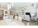 Spacious open-concept living area with dining, kitchen, and living room, ideal for Gathering gatherings at 11717 74Th E Cir, Palmetto, FL 34221