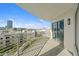 Balcony with sleek metal railings and skyline views showcases city living at 1209 E Cumberland Ave # 604, Tampa, FL 33602