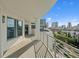 Spacious condo balcony boasting panoramic views of the cityscape on a beautiful, sunny day at 1209 E Cumberland Ave # 604, Tampa, FL 33602