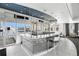 Poolside bar featuring a sleek counter, modern stools, and expansive windows offering pool views at 1209 E Cumberland Ave # 604, Tampa, FL 33602