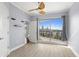 Bedroom with city views and a ceiling fan at 1209 E Cumberland Ave # 604, Tampa, FL 33602