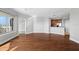 Open concept living space featuring hardwood floors and a glimpse of the kitchen at 1209 E Cumberland Ave # 604, Tampa, FL 33602