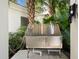 A stainless steel pet washing station for convenient pet care, located outdoors with lush greenery at 1209 E Cumberland Ave # 604, Tampa, FL 33602