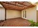 Cozy back porch offers a wood deck, string lights and a serene outdoor space at 121 28Th N Ave, St Petersburg, FL 33704