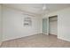 Bedroom with tile flooring and sliding door closet, providing functional living space at 121 28Th N Ave, St Petersburg, FL 33704