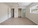 Bedroom featuring tile flooring, closet, and connecting door for convenient access at 121 28Th N Ave, St Petersburg, FL 33704