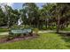 View of the Coffee Pot Park sign surrounded by mature trees and green spaces at 121 28Th N Ave, St Petersburg, FL 33704