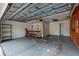 Spacious garage area with shelving and tool storage, providing functional workspace at 121 28Th N Ave, St Petersburg, FL 33704