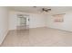 Open living space with tile flooring and a view into the dining area and kitchen at 121 28Th N Ave, St Petersburg, FL 33704
