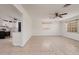 Bright living room with tile flooring, seamlessly connected to the adjacent kitchen at 121 28Th N Ave, St Petersburg, FL 33704