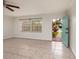 Bright and airy living room featuring neutral tile floors and a large window at 121 28Th N Ave, St Petersburg, FL 33704