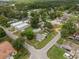 Beautiful aerial shot highlights community, showcasing well-spaced homes, green spaces, and the tranquil neighborhood layout at 12324 Pittsfield Ave, Tampa, FL 33624