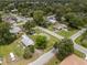 This aerial view captures the neighborhood's serene setting, well-maintained streets, and community's blend of residential charm at 12324 Pittsfield Ave, Tampa, FL 33624