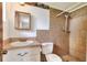 Bathroom featuring a tiled shower, neutral countertop and white cabinets at 12631 Hobson Simmons Rd, Lithia, FL 33547