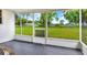 View of the yard from the screened porch at 12631 Hobson Simmons Rd, Lithia, FL 33547
