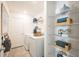Well-organized laundry room featuring a modern washer and dryer, storage shelves, and stylish decor at 13245 Tropical Breeze Way, Hudson, FL 34669