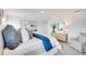 Serene main bedroom with neutral tones, plush bedding, and stylish furniture at 13245 Tropical Breeze Way, Hudson, FL 34669