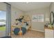 Whimsical bedroom featuring a charming wooden frame bed, whale decals, and soothing neutral tones at 13548 Tropical Breeze Way, Hudson, FL 34669