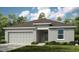 Charming single-story home with a two-car garage and well-maintained landscaping at 13548 Tropical Breeze Way, Hudson, FL 34669