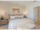 Comfortable main bedroom featuring cozy furnishings and soft neutral tones at 13548 Tropical Breeze Way, Hudson, FL 34669
