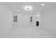 Bright bedroom with two large windows and views of the yard, offering natural light at 15012 Winterwind Dr, Tampa, FL 33624